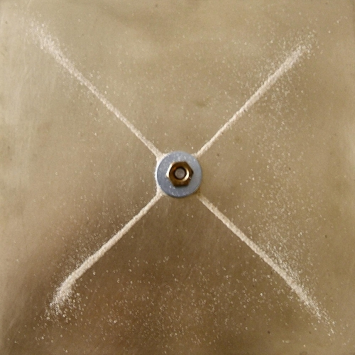 Chladni figure — sand on a vibrating square metal plate forming an X-shaped nodal pattern
