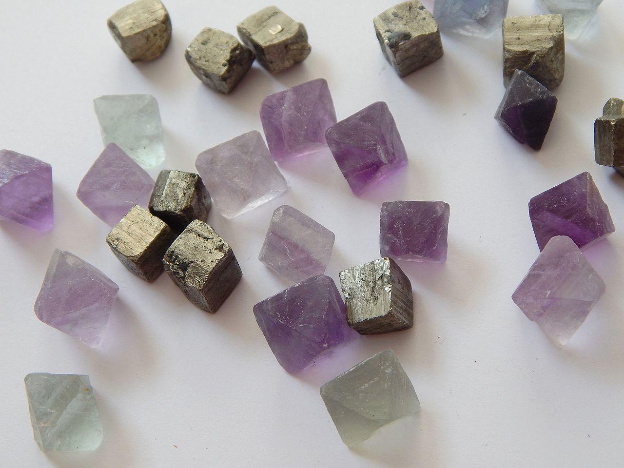 Fluorite octahedral crystals alongside cubic pyrite