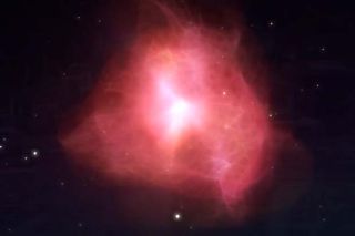 A stellar nebula — a vast cloud of gas expanding in three dimensions through space, from which stars and galaxies condense